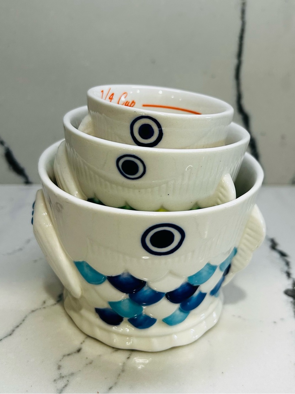 Anthropology Stackable Fish Food Measuring cups